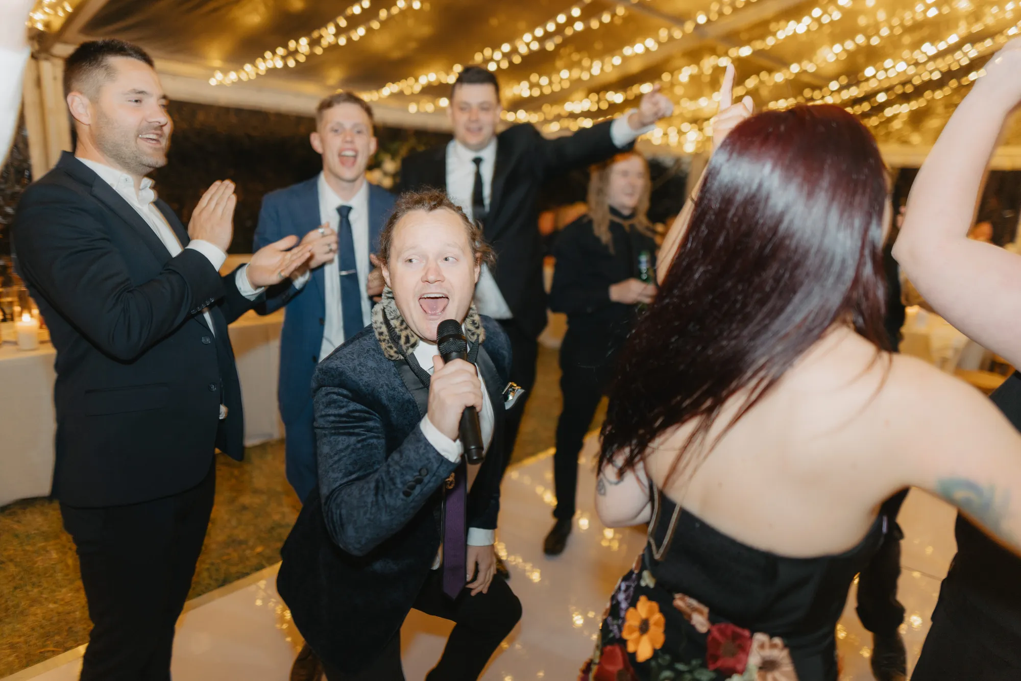 Ian performing at a wedding